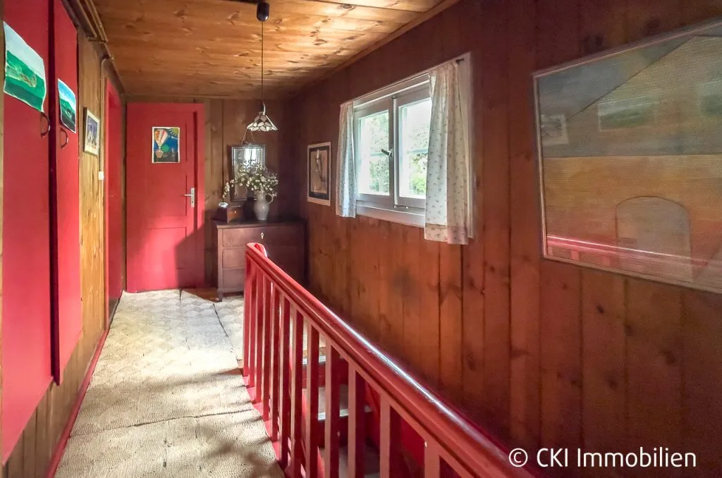 Immobilienangebot - Krailling - Alle - Krailling im Würmtal - Charmantes Isartaler Holzhaus auf sonnigem Südwest-Grundstück mit Potenzial