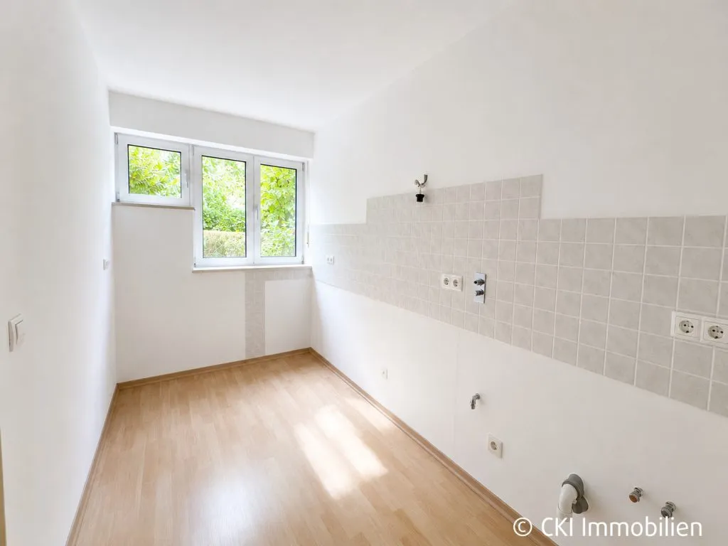 Immobilienangebot - München - Alle - Charmante 2-Zi.-Gartenwohnung mit Terrasse in München-Hadern – ruhig gelegen & nur 600 Meter zur U6!